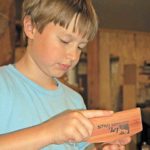 Like his father, Greg, 8-year-old Jacob Longuillo is a crackerjack call-maker himself.