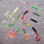 A variety of curlytail and swimming-action plastic baits are recommended for long-lining.