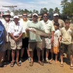Lee Thomas shows off a 12.19-pound striper that was big fish and helped Team Catchall win the July 9 Midlands Striper Club event on Clarks Hill.