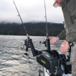Downriggers are the preferred way to get live baits ore trolling lures down into deep water where big Lake Jocassee trout are looking for an easy meal.