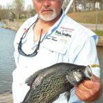 James Howell suggests casting the flooded undergrowth along Lake Blalock’s banks to catch male crappie.
