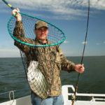 Crappie relating to deep brush piles, logs or other forms of woody cover are often very aggressive in the fall, and some of the best fishing can take place well after the sun has risen.