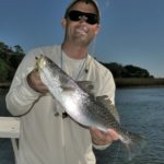 As the water temperature rises, speckled trout will pour out of the ocean into Bulls Bay, following baitfish.