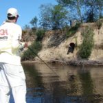 Stu Caulder targets the area below a drain pipe, a common feature on some of the spoil islands in the lower Cape Fear River.