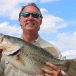 Dave Miller shows off the 12 1/2-pound bass he caught over the weekend in a lowcountry pond. "The photos don't do it justice," said guide Mike McSwain.