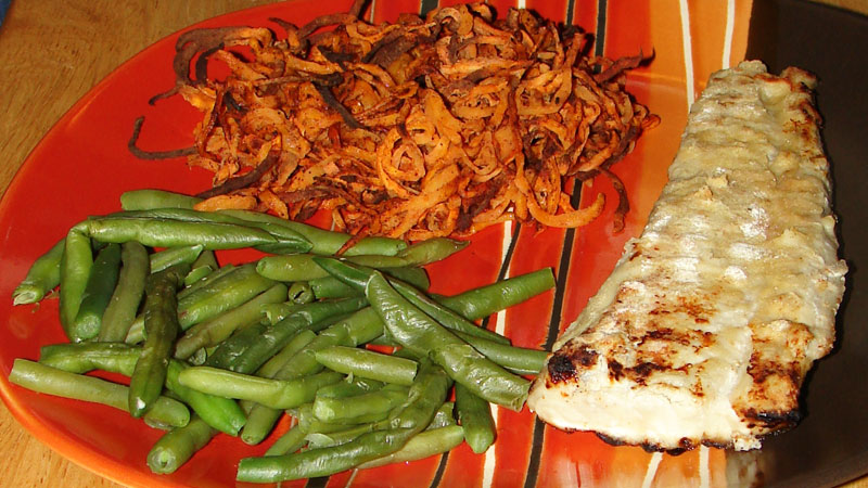 Grilling king mackerel filets that have been soaked in a 7 Up hot sauce marinade makes for a great fish dinner on a warm June evening.
