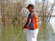 Bass pro Tim Grein tries to target shoreline gum trees and willow bushes when the water level rises a few feet above normal at Kerr Reservoir.