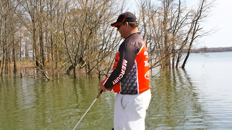 Bass pro Tim Grein tries to target shoreline gum trees and willow bushes when the water level rises a few feet above normal at Kerr Reservoir.