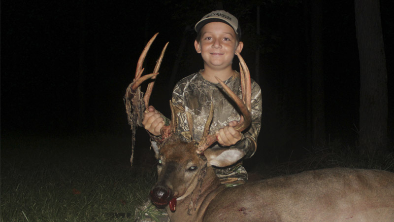 After an 8-point buck gave him the slip, 10-year-old Blake Burgess was happy to see this 9-point buck with shredded velvet show up.