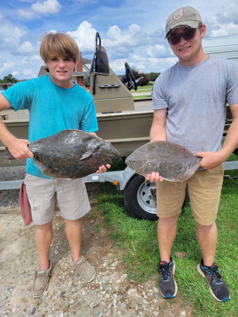 Ashton and Bryson Britt gigged these flounder with their dad Neal Britt at Sneads Ferry, N.C.
