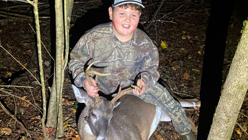 This is my son Matthew Cohen, age 10. This 6-pointer is his first buck.
--James Cohen