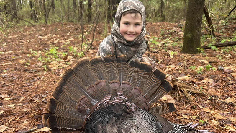 After a tough week of hunting during late March, 2023, youth hunter Gauge Britt took down a double-bearded gobbler that was a true monster.