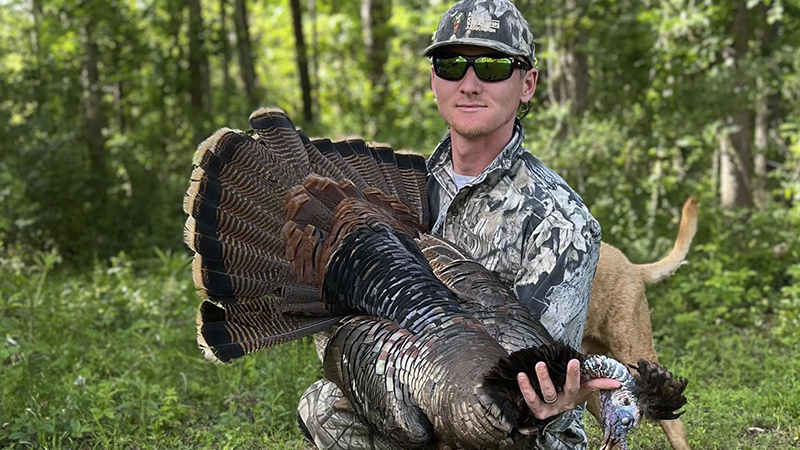 While hunting in Williamsburg County, SC on April 10, 2023, Michael Herlihy of Moncks Corner killed a very unique, feather-headed gobbler.