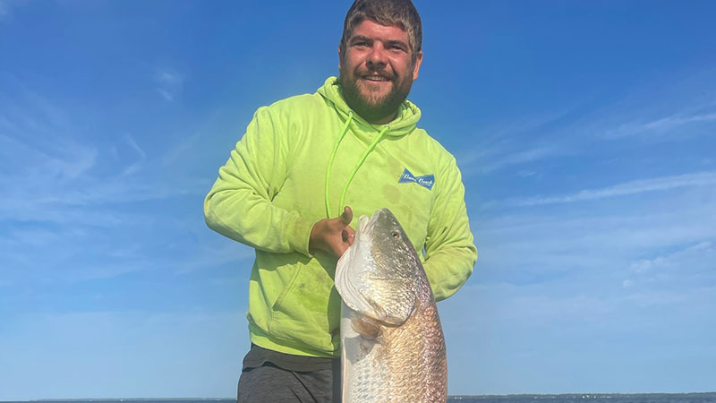 Our first time fishing for bull reds on the Neuse. We went in blind and found some good schools of bait and made it happen at about 7:45. Reeled in this 46-inch beauty on the third cast.