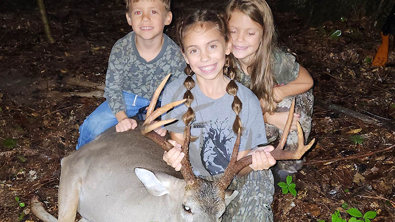 Lainey Sparks killed this buck in Wayne County, NC on Oct. 23, 2023. Her brother and sister joined her for the celebration.
