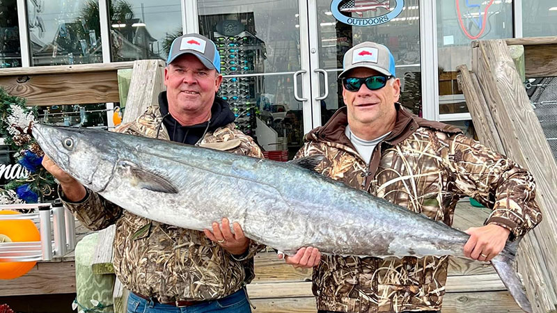 Eric Floyd and Howard Tucker caught this 67.9 pound king mackerel while live bait fishing east of Cape Lookout Shoals.