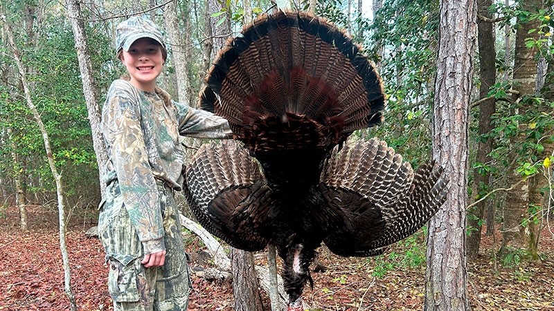 Youth hunter Tenley Schutte of Horry County bagged a 22-pound, double-bearded gobbler during SC's Youth Weekend.